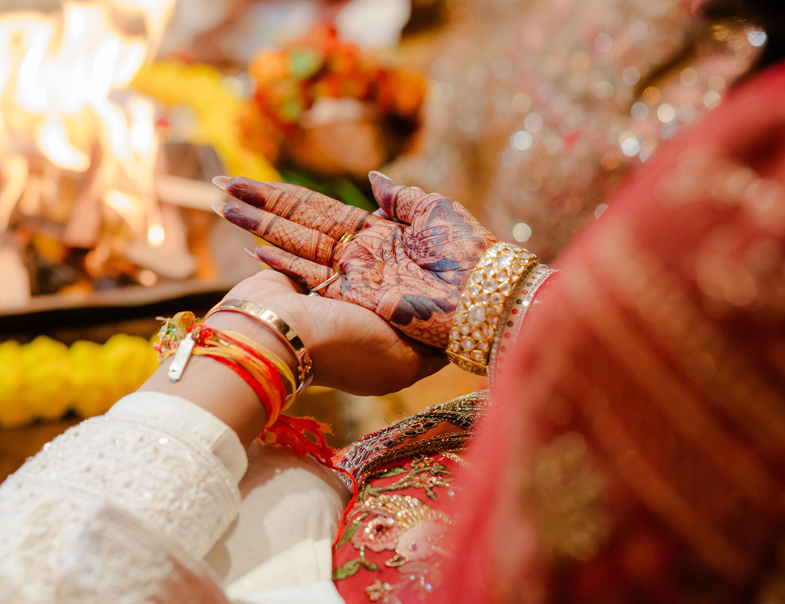 A bride and groom doing wedding rituals on their wedding day